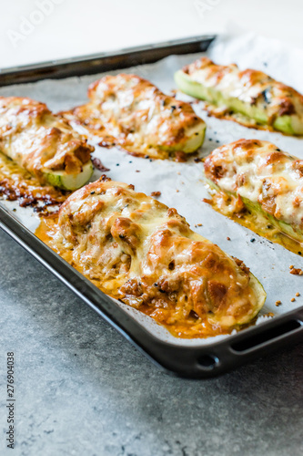 Baked Zucchini Courgettes Stuffed with Cheese and Dill.