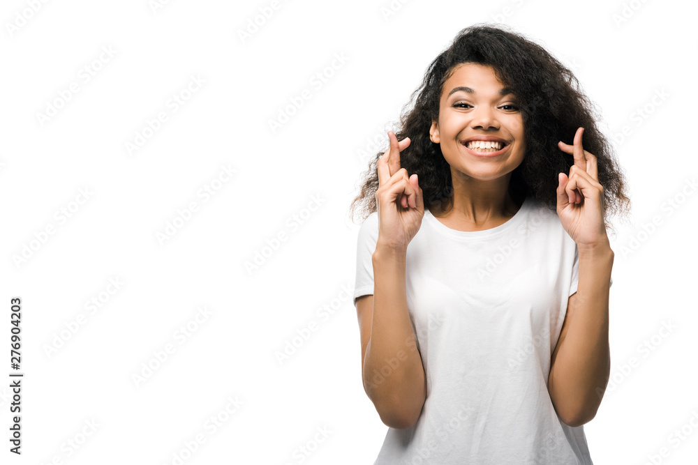 curly african american woman with crossed arms smiling isolated on white curly african american woman with crossed arms smiling isolated on white