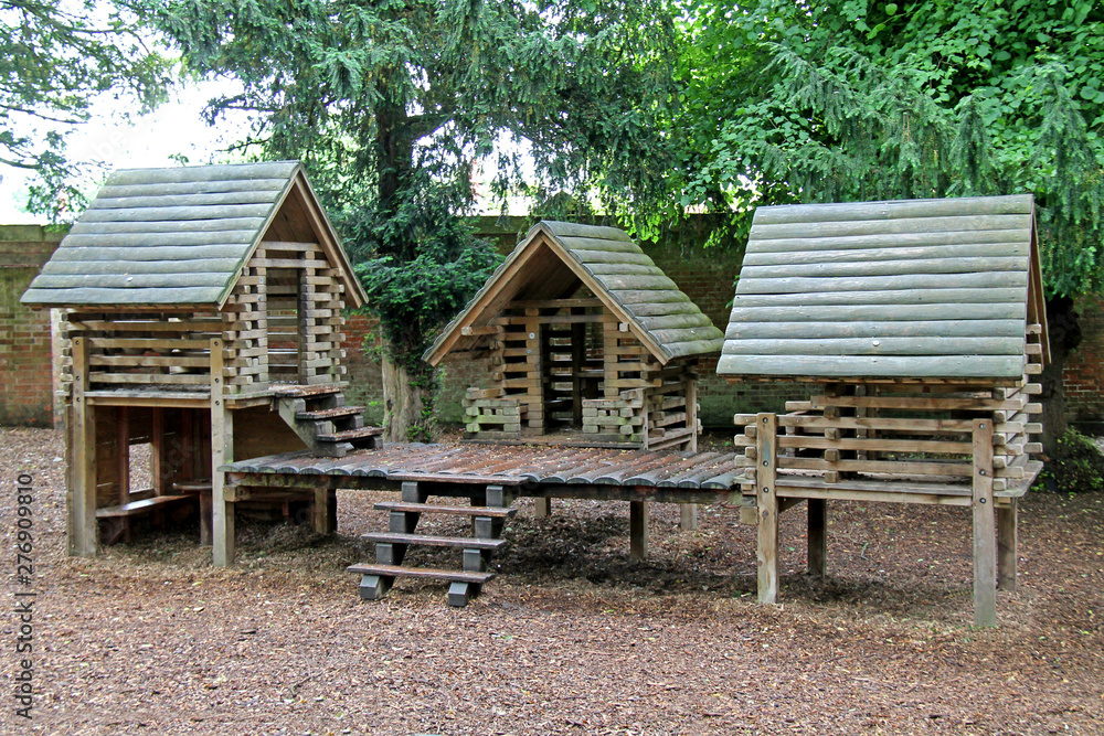 A Large Wooden Playhouse in a Woodland Playground.