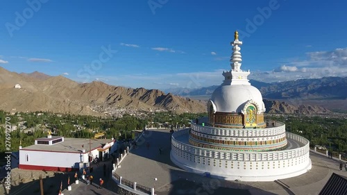 Shanti Stupa is a Buddhist white-domed stupa on a hilltop in Chanspa, Leh district, Ladakh, in the north Indian state of Jammu and Kashmir.  photo