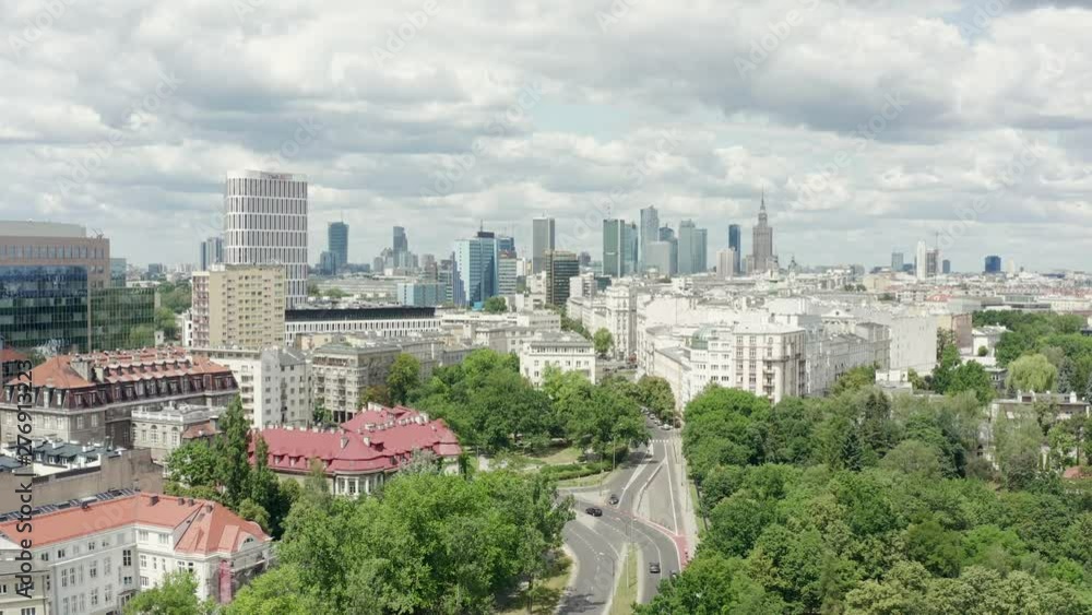 Aerial view of the city of Warsaw. Flight over residential houses in a stack of skyscrapers. Shows buildings and skyscrapers with car traffic in the Street below. Shot Drone 4K. Aerial view of the city of Warsaw. Flight over residential houses in a stack of skyscrapers. Shows buildings and skyscrapers with car traffic in the Street below. Shot Drone 4K.