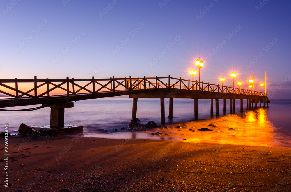Early hours of daylight on the beach of Marbella on the Costa de Sol (Malaga) Spain