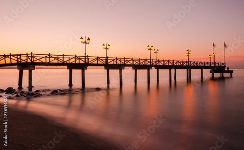 Early hours of daylight on the beach of Marbella on the Costa de Sol (Malaga) Spain