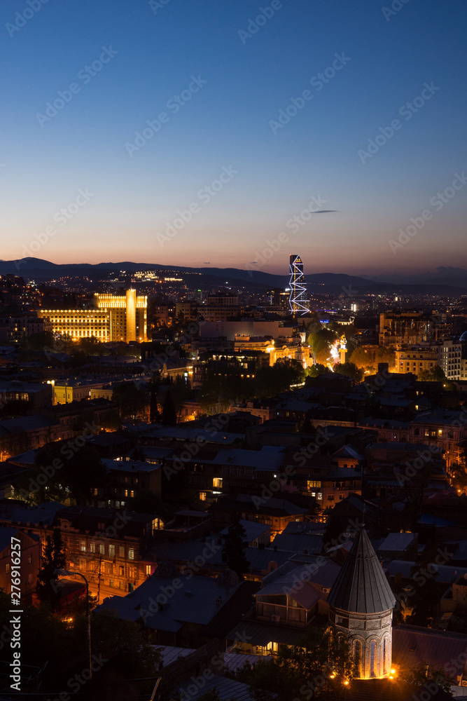 nighttime in tblisi city panorama far view