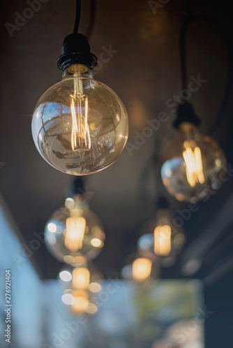 Loft round light bulbs on black wires