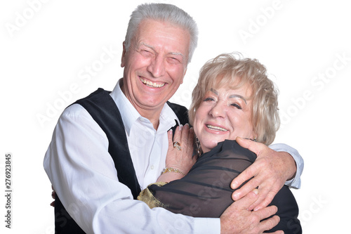 Happy senior couple isolated on white background