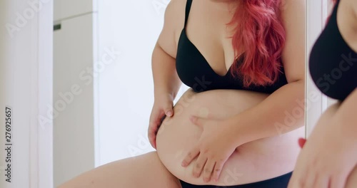 fat asian girl look mirror