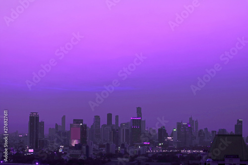 Skyscrapers of the Metropolitan Area under Vivid Purple Evening Sky © jobi_pro