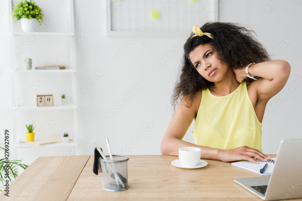 exhausted brunette african american woman having neck pain exhausted brunette african american woman having neck pain