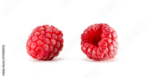 Raspberry with leaves on white background. Ripe red raspberries isolated on white background