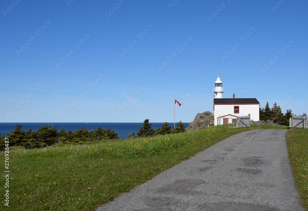 Lobster Cove Head lighthouse near Rocky Harbour; scene along the Viking trail in the Gros Morne National Park, Newfoundland Canada Lobster Cove Head lighthouse near Rocky Harbour; scene along the Viking trail in the Gros Morne National Park, Newfoundland Canada