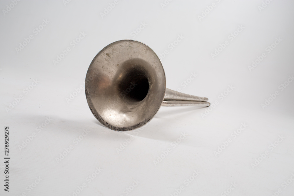 The old horn on white background isolated