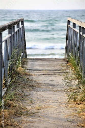 wooden fence on the beach