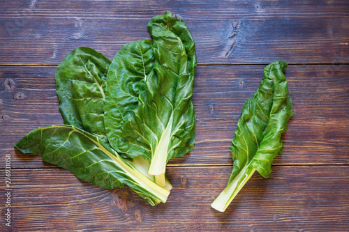 Balkan cuisine. Blitva ( chard leaves ) - popular leafy vegetables.  Dark rustic background