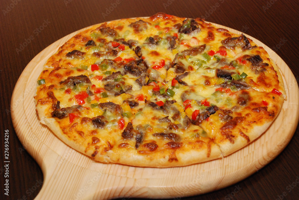 Pizza on the thin dough with cheese Pizza on the thin dough with cheese