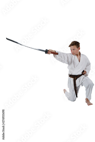 Teenage boy doing martial arts photo