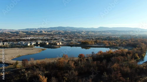 Boise Foothills - Geese flying over pond
