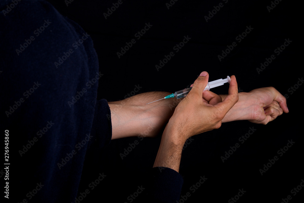 Fototapeta premium .Drugs concept Illness concept. Drug contact, young man very stressed, drug addicted young male