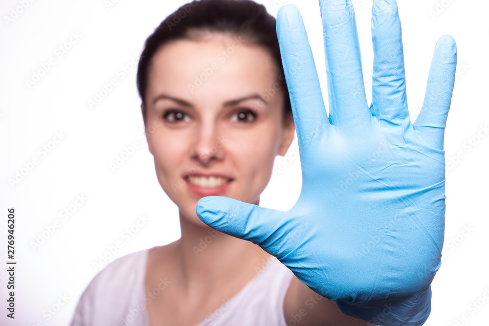 beautiful young woman in gloves on hands beautiful young woman in gloves on hands