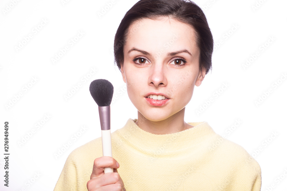 attractive girl does makeup, makeup brush attractive girl does makeup, makeup brush