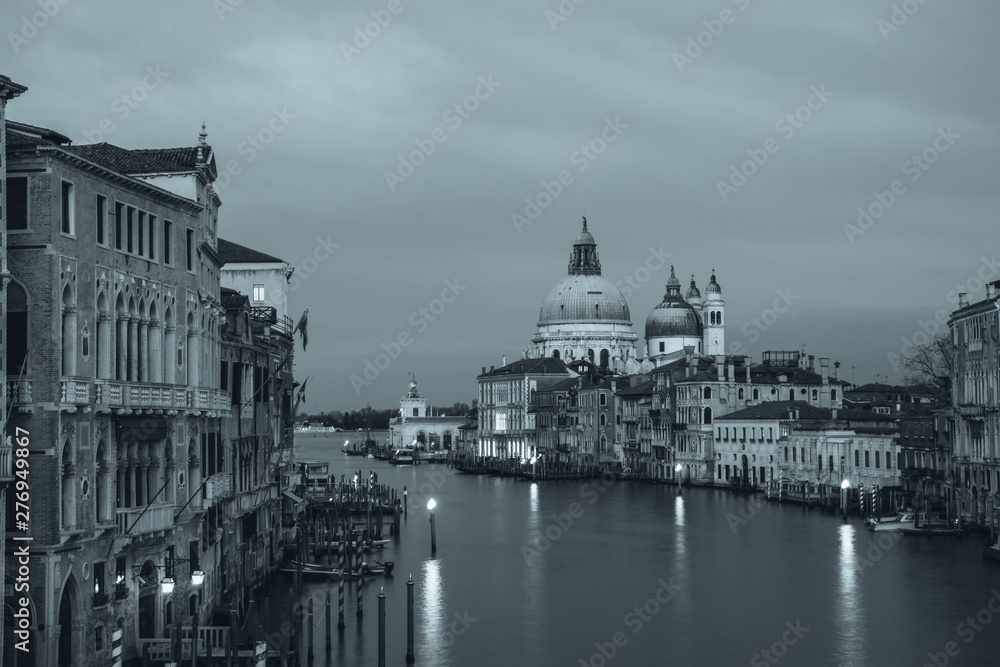 Fototapeta premium Beautiful view on Basilica di Santa Maria della Salute in golden evening light at sunset in Venice, Italy