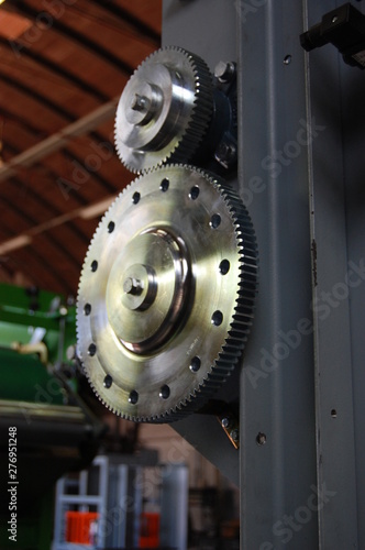 gears mounted on the steel case of an industrial machine