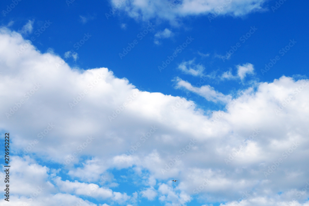 white clouds on bright blue sky for background white clouds on bright blue sky for background