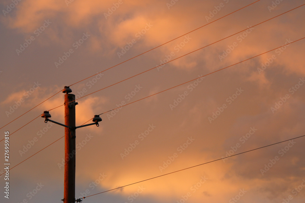 Telephone Pole at Dusk with Dramatic Sky
