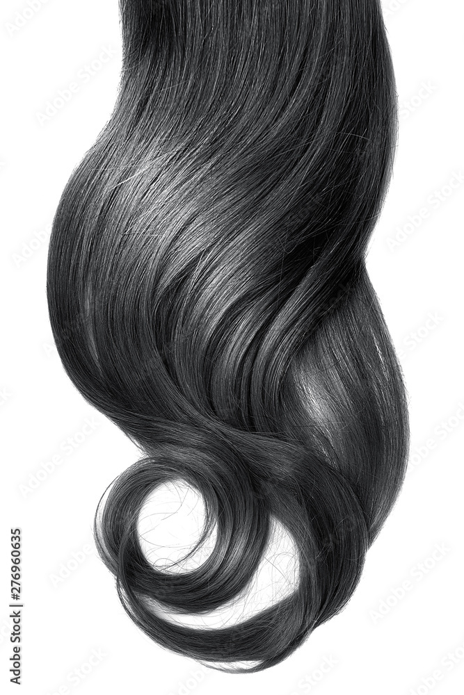 Fototapeta premium Black wavy hair isolated on white background