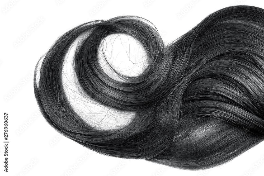 Fototapeta premium Black wavy hair isolated on white background