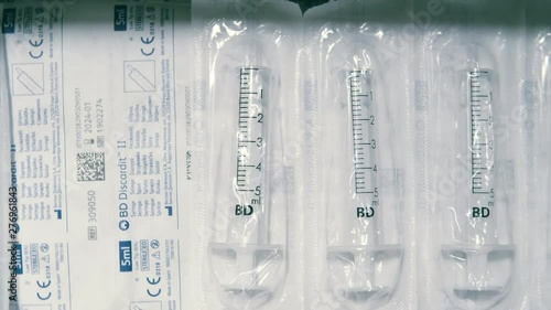 Medical healthcare 5 ml sterile drug syringes, top down shot photo