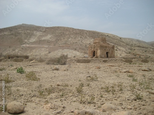 Middle East or Africa  picturesque bare mountain range and a large sandy valley desert landscapes landscape photography. Horizontal frame