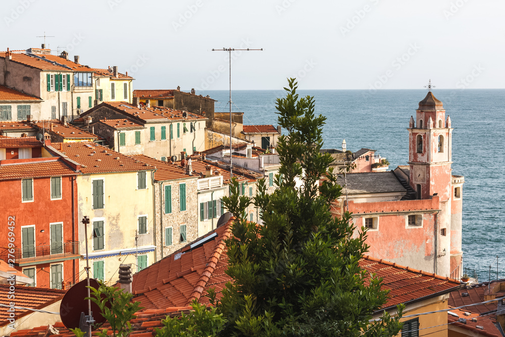 The city of Tellaro with it's pink church in the evening