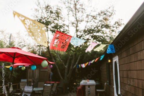 backyard decorated with colorful mexican decorations