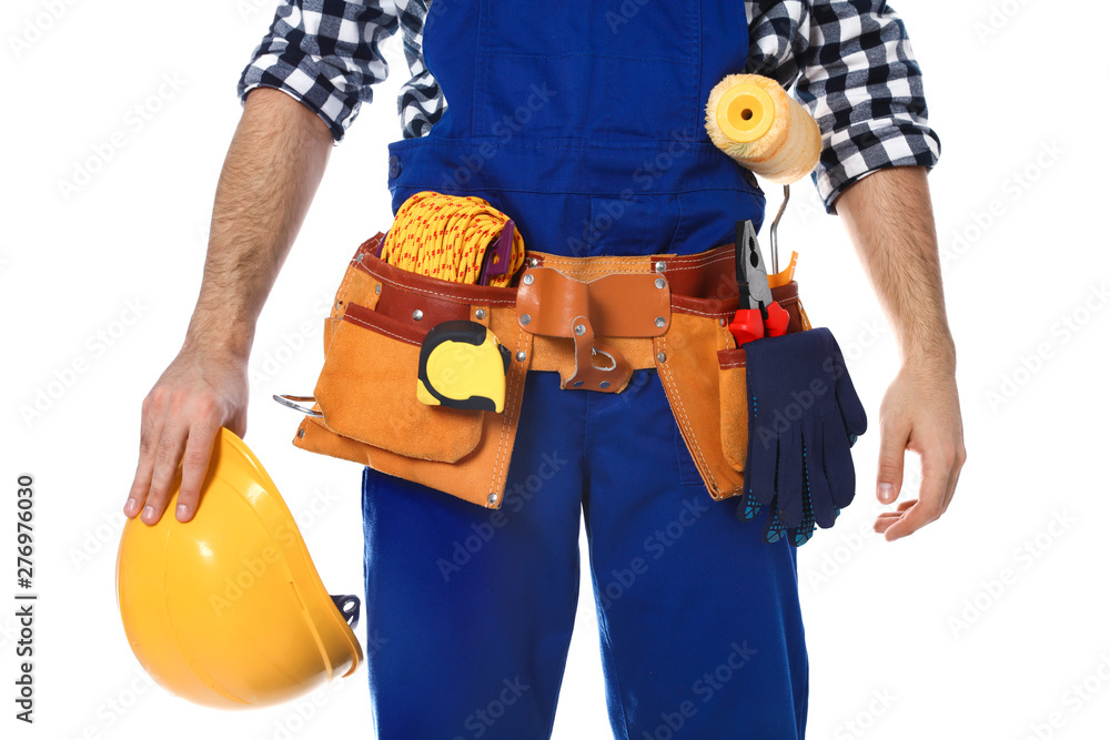 Construction worker with tool belt on white background, closeup Construction worker with tool belt on white background, closeup
