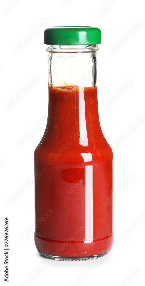 Delicious tomato sauce in glass bottle on white background Delicious tomato sauce in glass bottle on white background