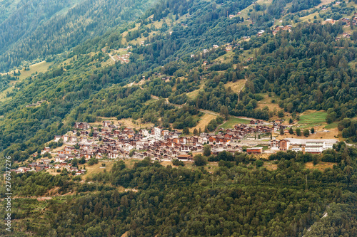 Summer landscape with many chalet houses in swiss Alps, canton of Valais, Switzerland