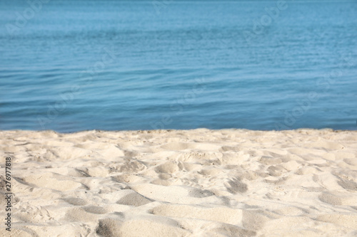 Fototapeta Naklejka Na Ścianę i Meble -  View of sea water and beach sand on sunny summer day