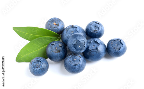 Fresh raw tasty blueberries with leaves isolated on white