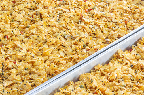 Yellow cereal for breakfast mix with grains and caramel became to snack