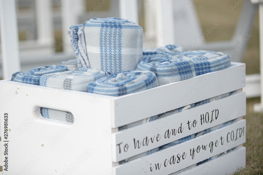 White slated crate at wedding with 