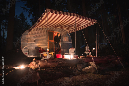 vintage camper trailer at night