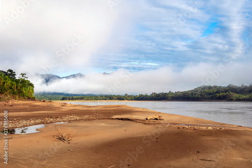 Green rainforest mountains in clouds, Amazon river basin, South America