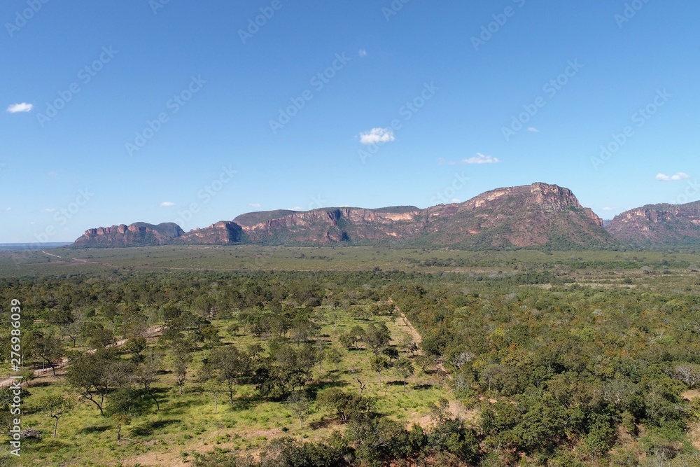 Aerial view of MT 351 road, way to Chapada dos Guimarães, Mato Grosso, Brazil. Great landscape. Travel destination. Vacation travel. Touristic point.