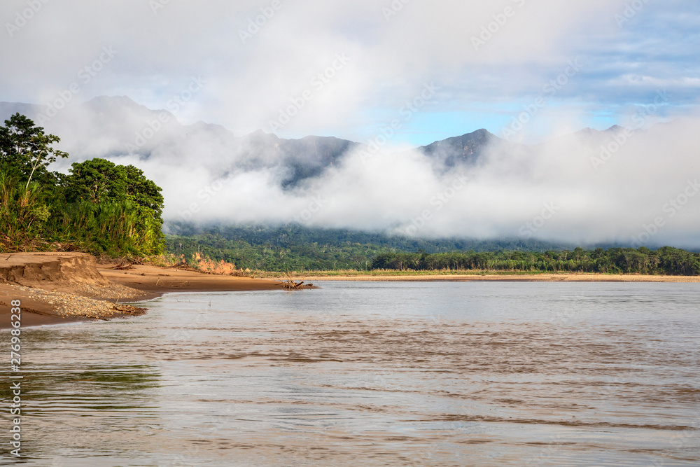 Green rainforest mountains in clouds, Amazon river basin, South America