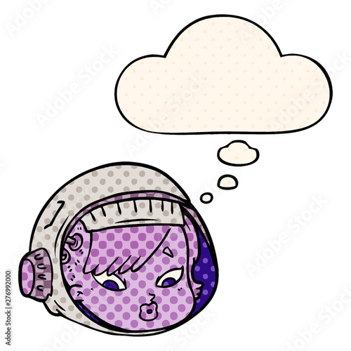 cartoon astronaut face and thought bubble in comic book style