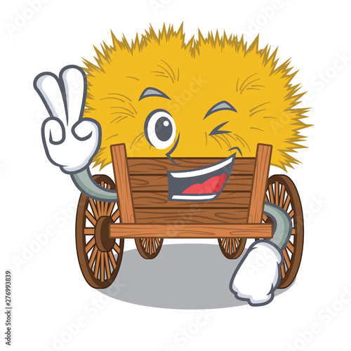 Two finger hayride mascot in beside the barn