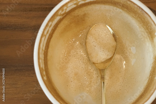 cup of coffee , empty coffee cup on the table