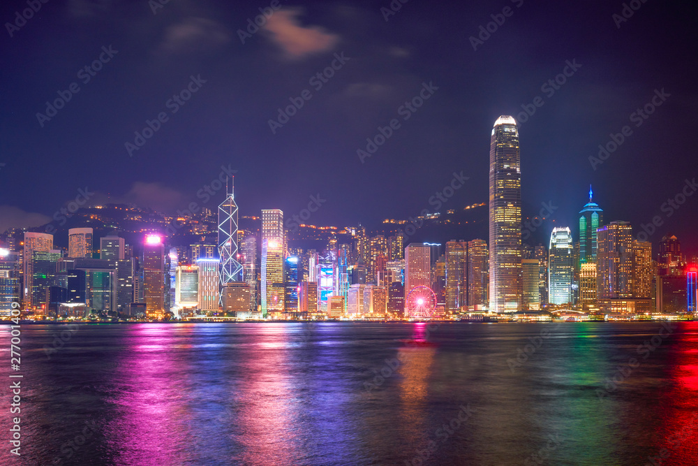 night cityscape view of hong kong victoria harbour