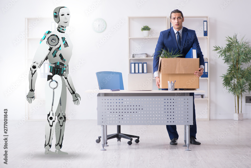 Concept of robots replacing humans in offices Concept of robots replacing humans in offices